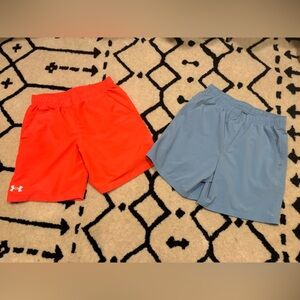 Under Armour red athletic shorts and DSG blue athletic shorts
